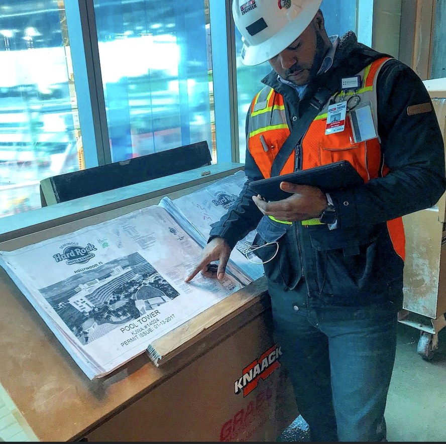 David Norris with a colleague at a construction site